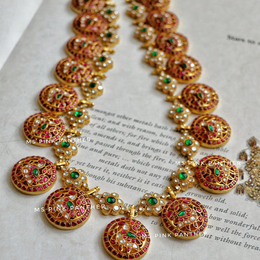 KUNDAN LONG BOTTU HAARAM WITH PEACOCK MOTIF.