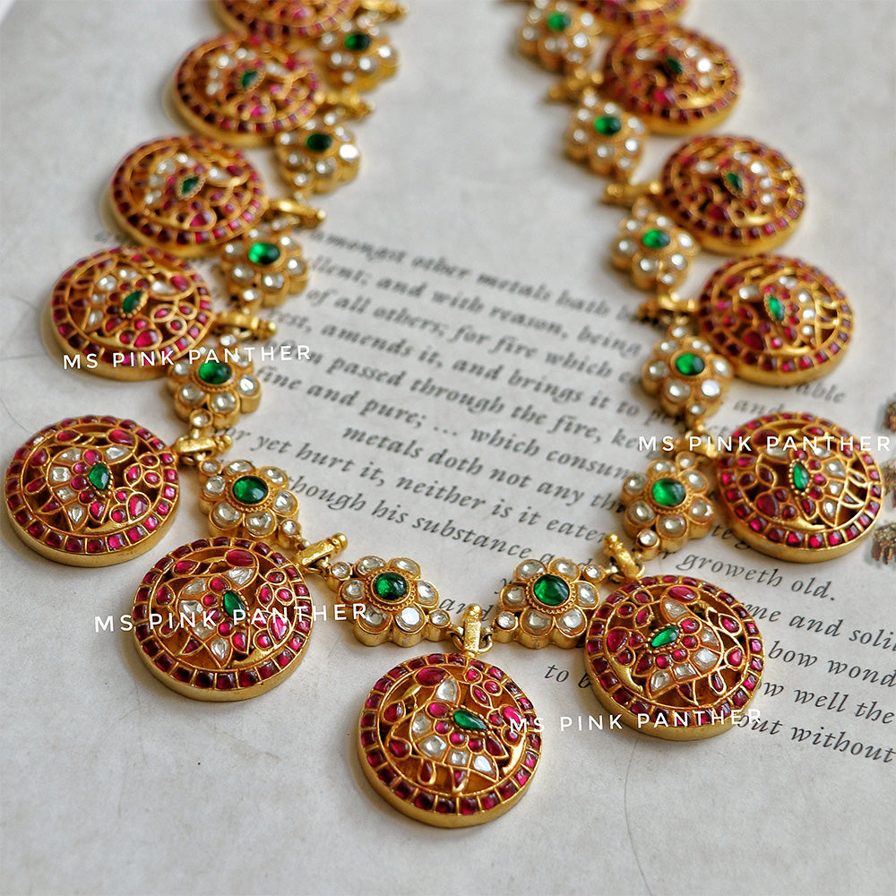 KUNDAN LONG BOTTU HAARAM WITH PEACOCK MOTIF.
