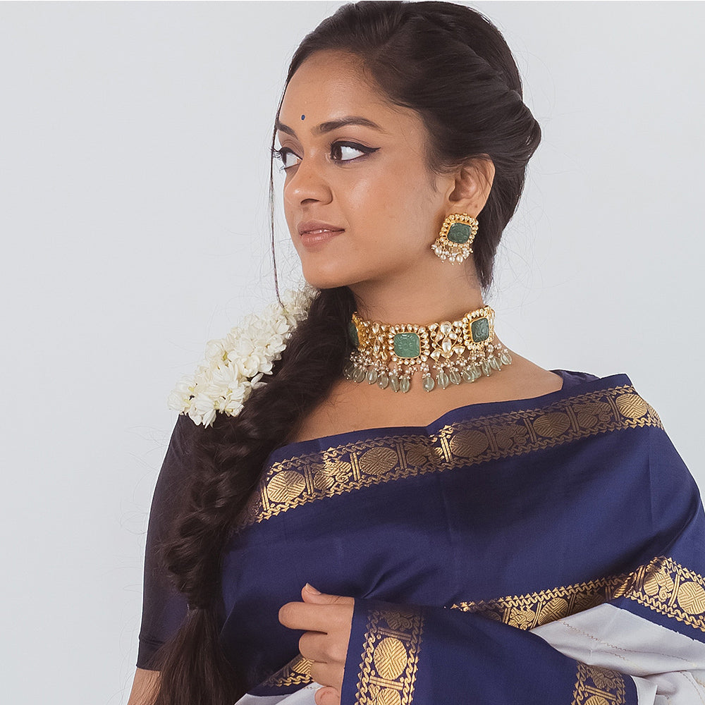 KUNDAN LOOK STONES CHOKER AND EARRINGS.