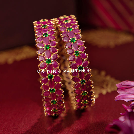 FLOWER SHAPED RUBY BANGLE.